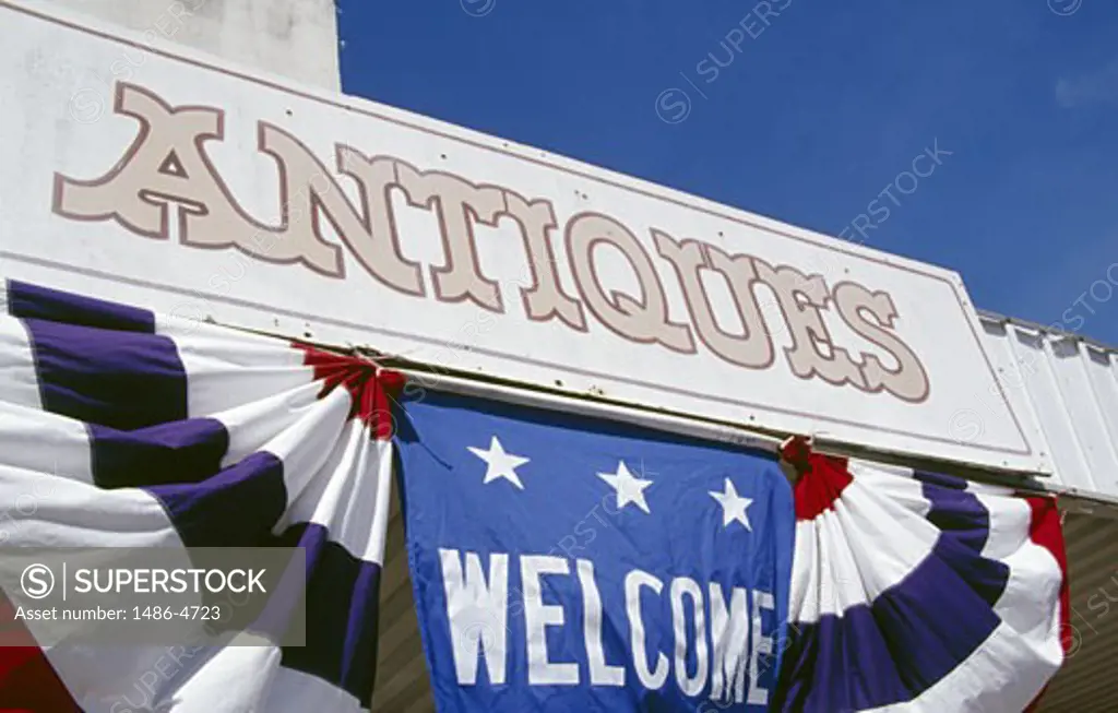 USA, Texas, welcoming sign at shop with antiques