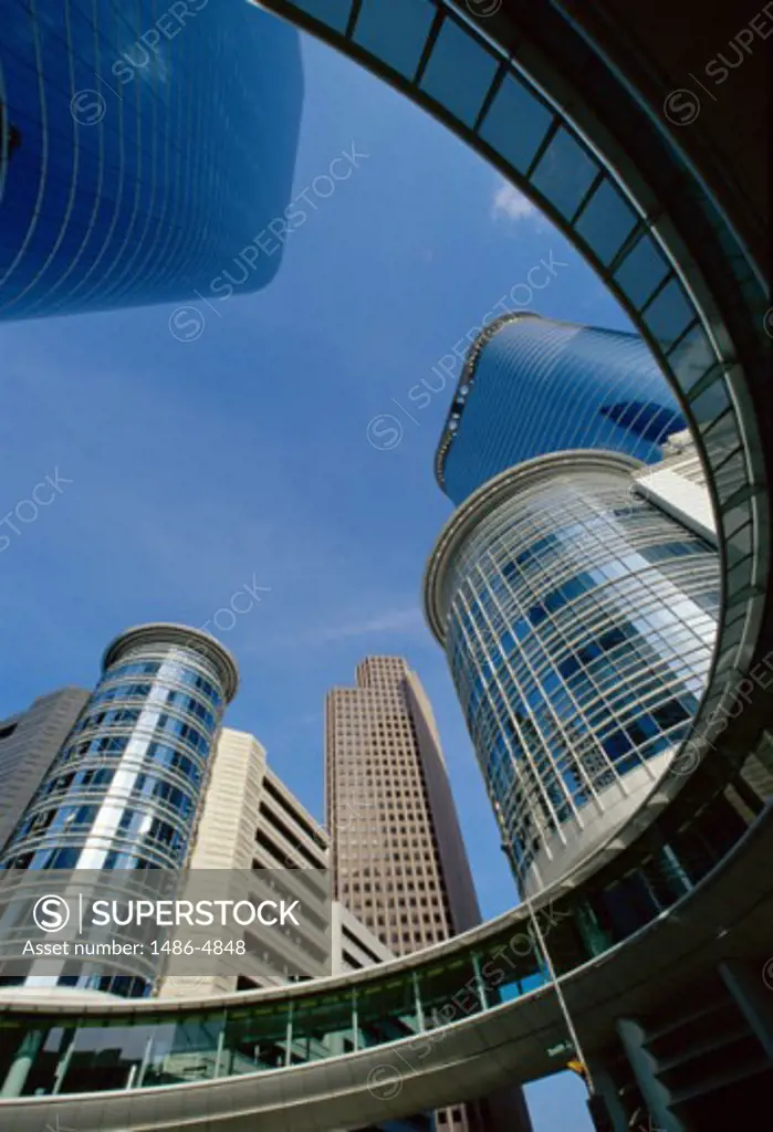 Low angle view of skyscrapers in a city, Houston, Texas, USA