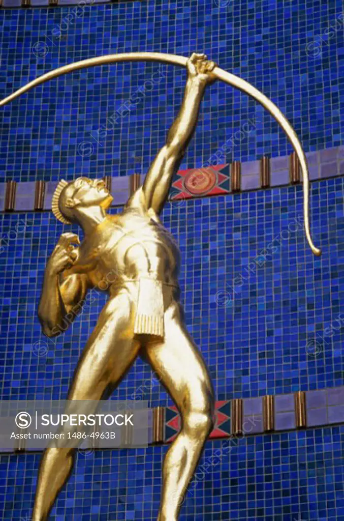 Golden statue of the Tejas Warrior, Fair Park, Dallas, Texas, USA
