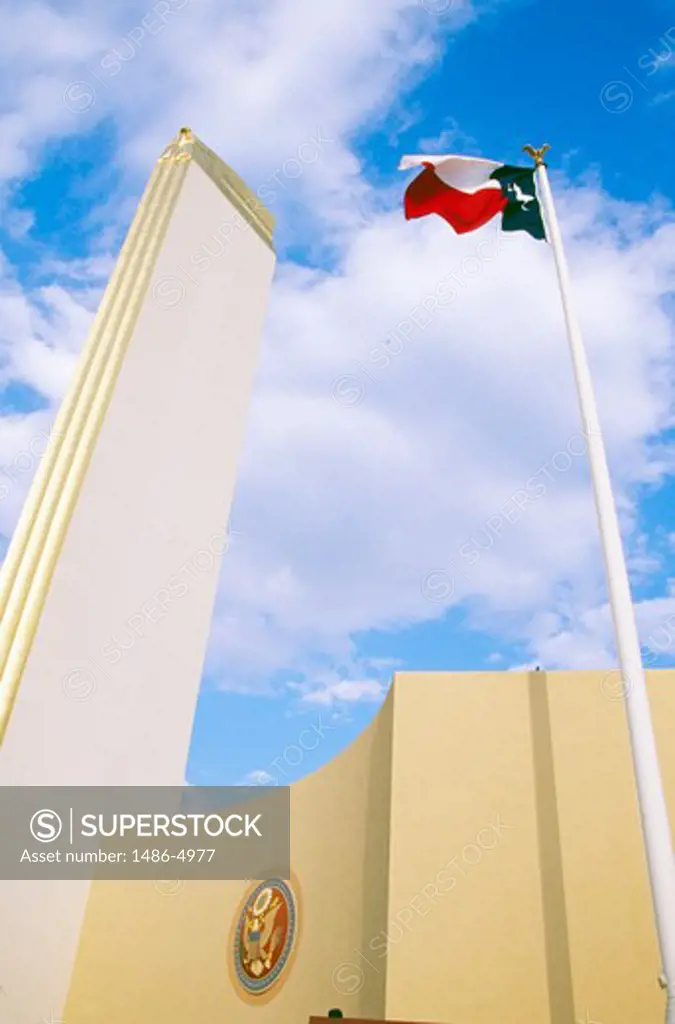 USA, Texas, Dallas, Fair Park, low angle view of monument and flag of Texas