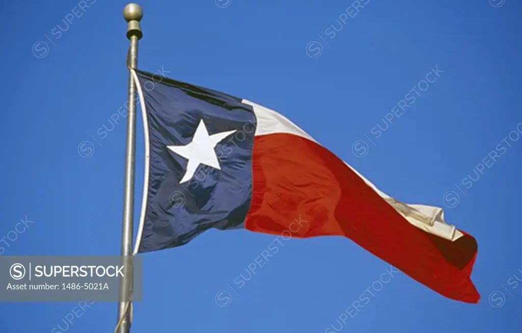 Texas State Flag against blue sky