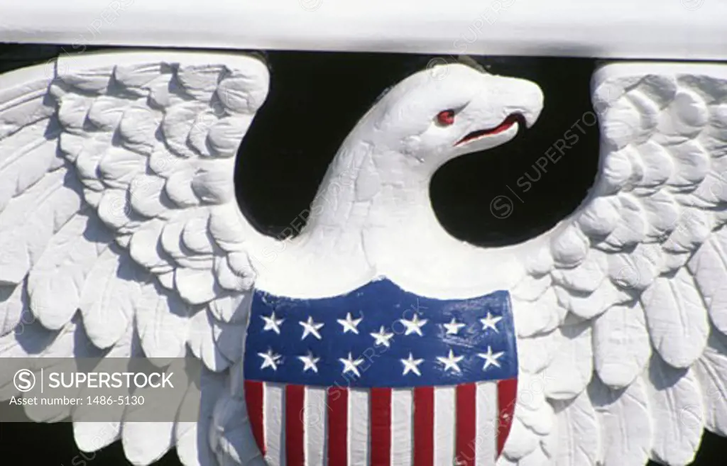 Bas-relief depicting eagle with american flag on torso