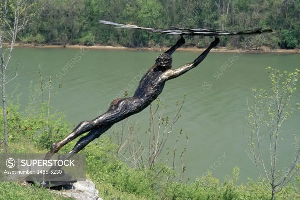 USA, Tennessee, Chattanooga, sculpture at the edge of riverbank