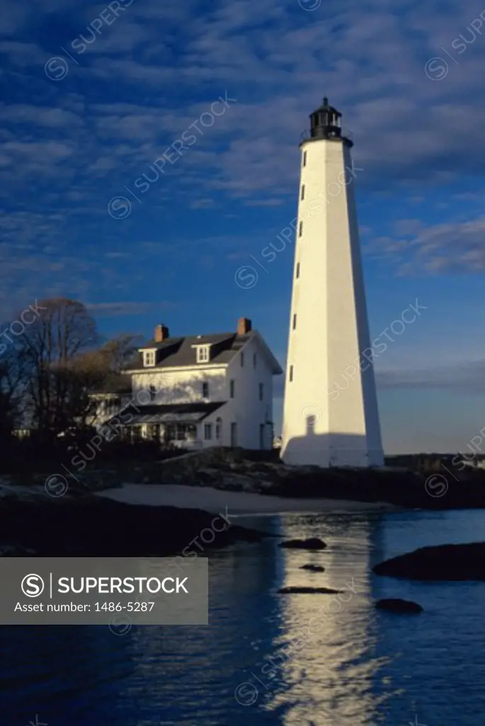 Reflection of a lighthouse in water, New London Harbor Lighthouse, New London, Connecticut, USA