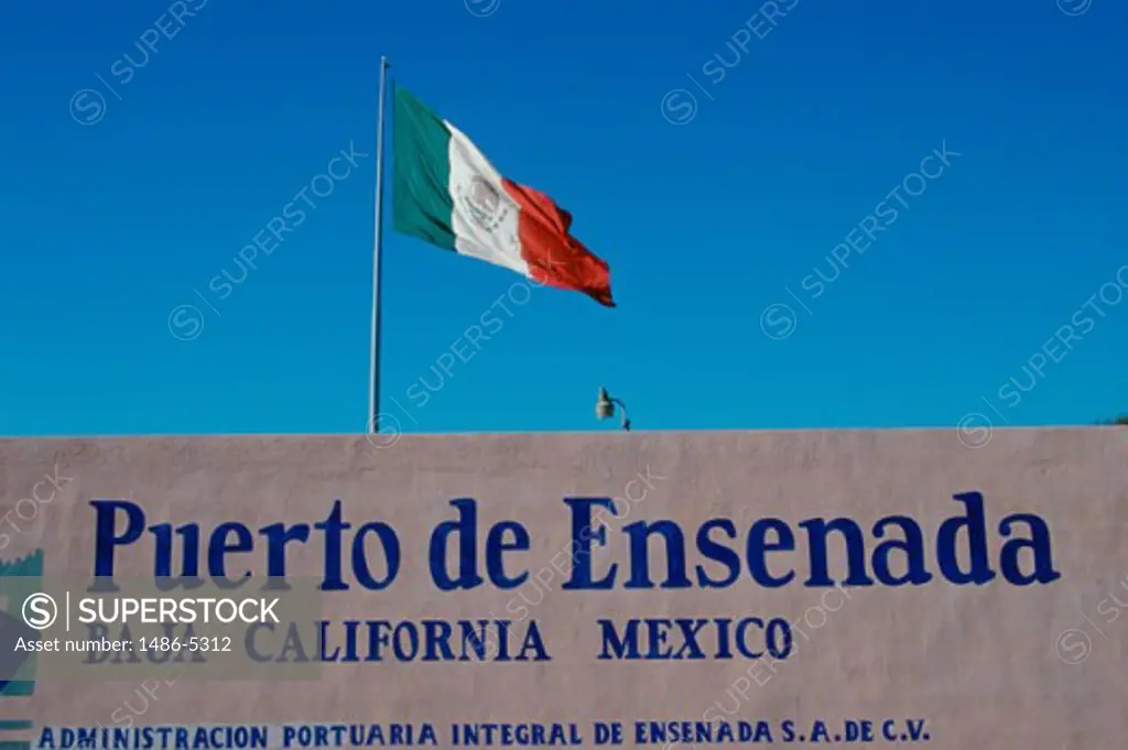 Low angle view of a flag on top of a building, Ensenada, Mexico