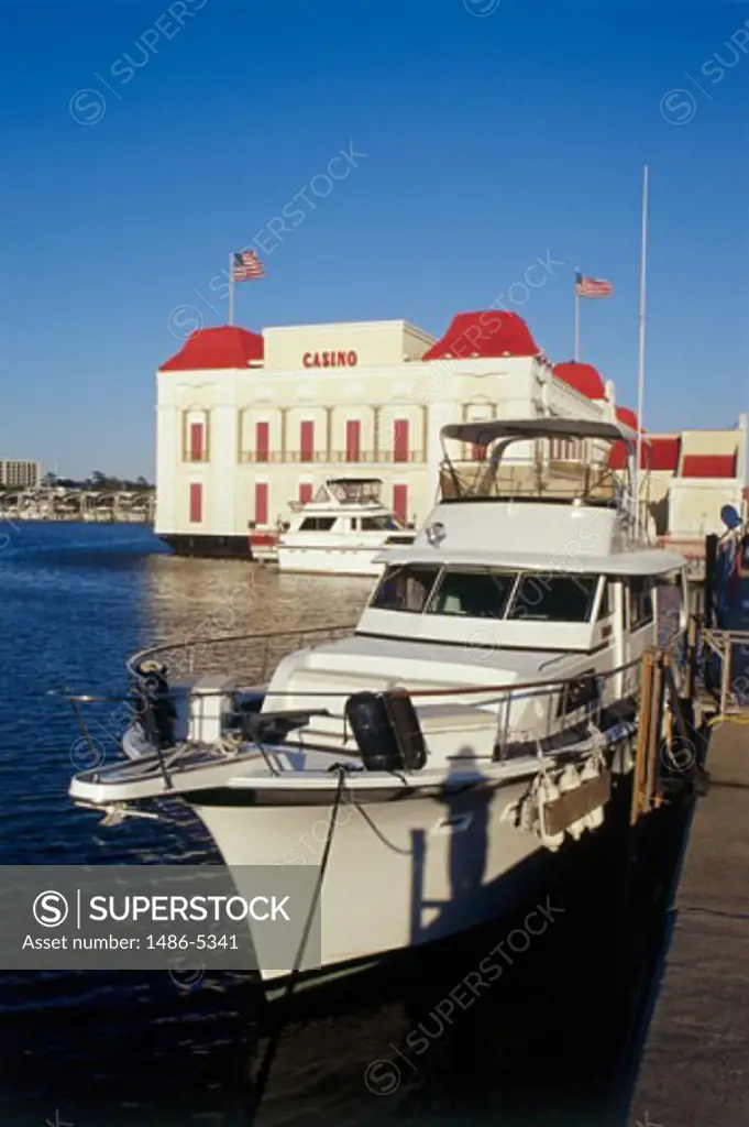 Boats at a dock in front of a casino, President Casino, Biloxi, Mississippi, USA