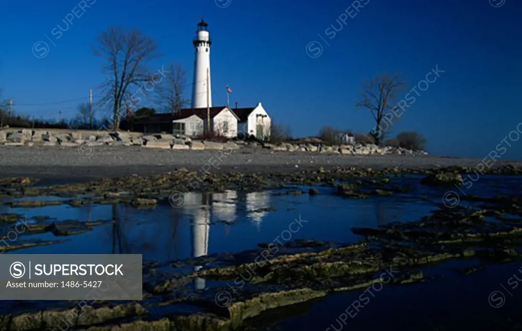 Reflection of a lighthouse in water, Wind Point Lighthouse, Racine, Wind Point, Wisconsin, USA