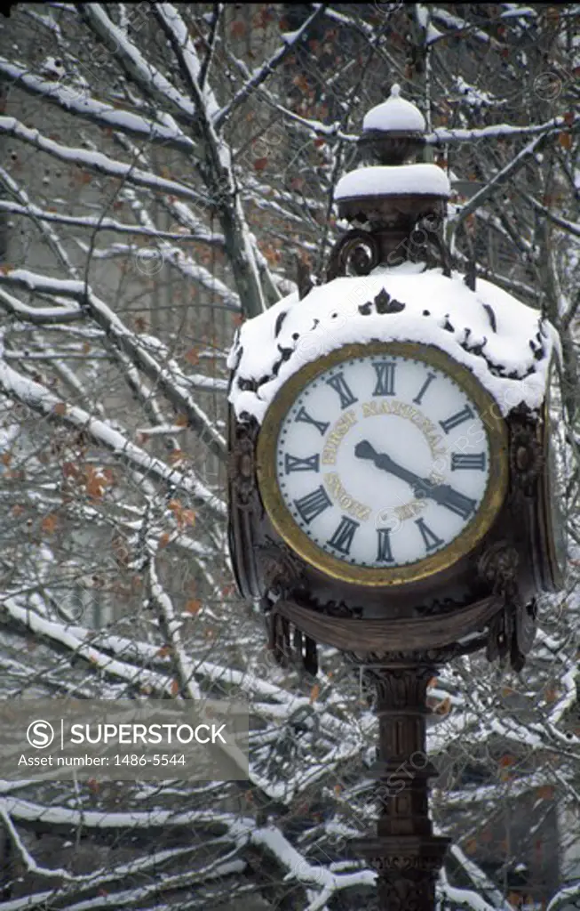 USA, Utah, Salt Lake City, Outdoor clock covered with snow