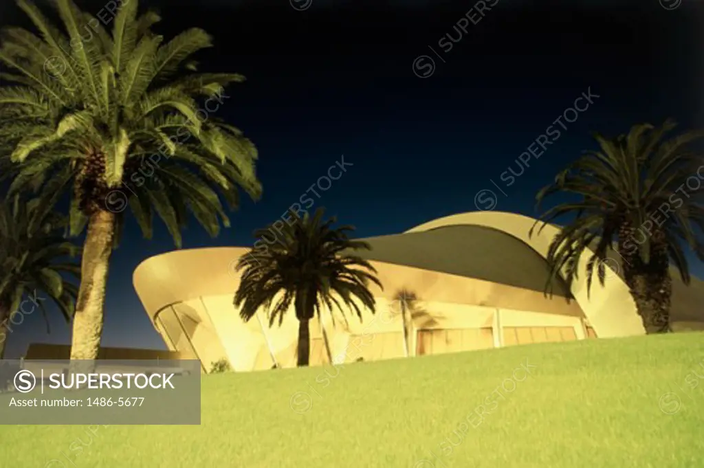 Palm trees in front of a convention center, Anaheim Convention Center, Anaheim, California, USA