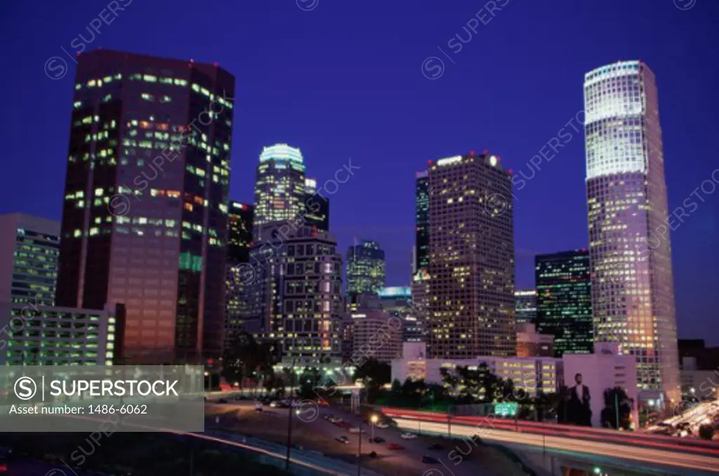 Buildings lit up at night, Los Angeles, California, USA