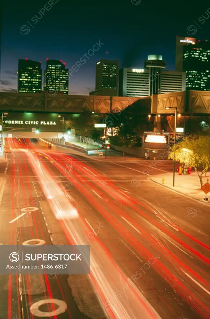 USA, Arizona, Phoenix, traffic light trails on urban road