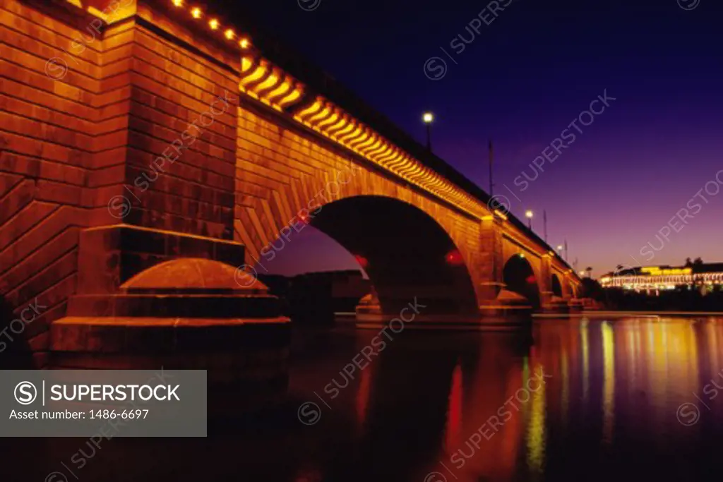 Low angle view of an arch bridge lit up at night, London Bridge, Lake Havasu City, Arizona, USA