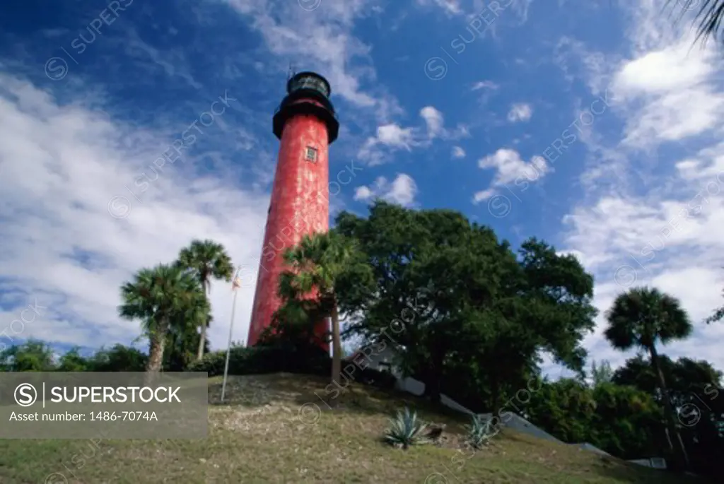 Low angle view of a lighthouse on a hilltop, Jupiter Inlet Lighthouse, Jupiter, Florida, USA