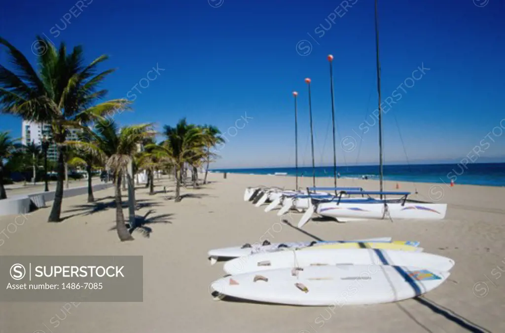 Sailboats and surfboards on the beach, Fort Lauderdale, Florida, USA