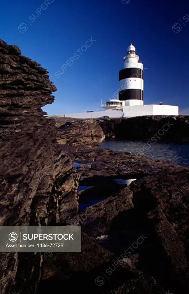 Lighthouse on a cliff, Hook Lighthouse, Waterford Harbour, Waterford, Republic of Ireland