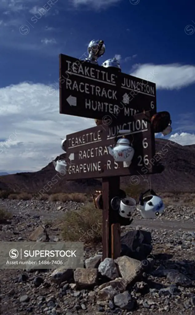Street name signboards in a field, Teakettle Junction, Death Valley National Park, California, USA