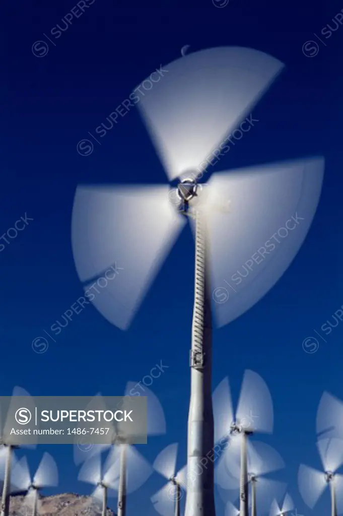 Low angle view of wind turbines spinning, Palm Springs, California, USA