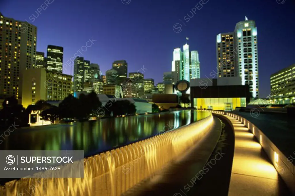 Buildings lit up at night, San Francisco, California, USA