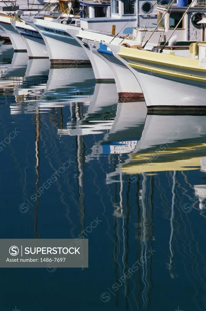 Boats docked in a harbor