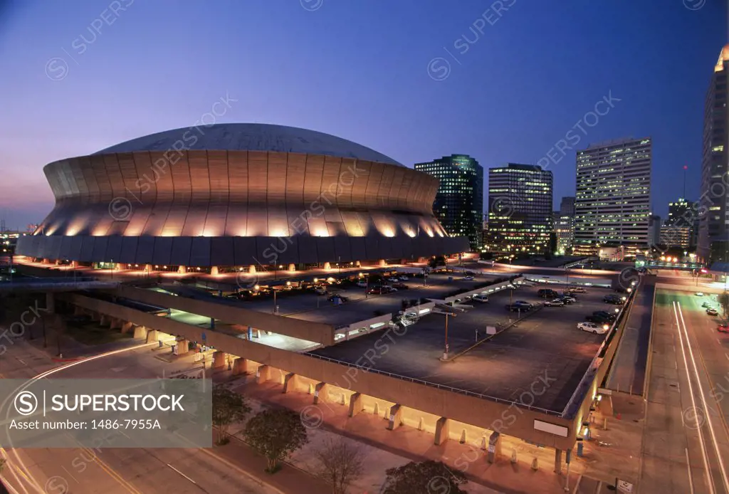 Buildings in a city lit up at night, Louisiana Superdome, New Orleans, Louisiana, USA