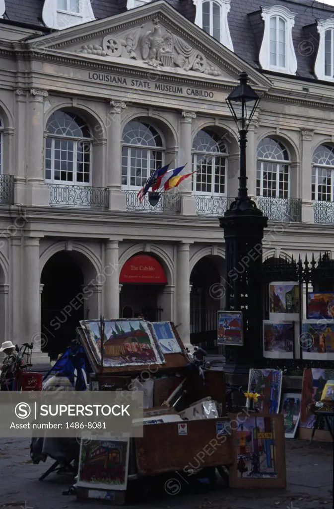 Paintings stall in front of a museum, Louisiana State Museum, Jackson Square, French Quarter, New Orleans, Louisiana, USA