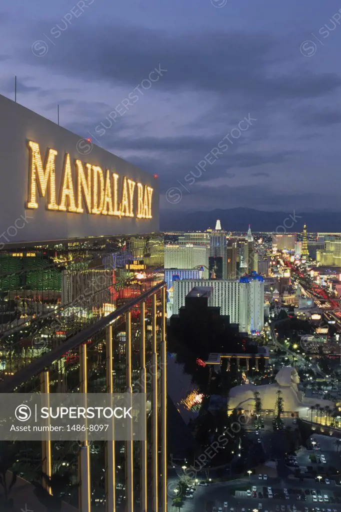 Neon sign on top of a casino lit up at night, Mandalay Bay Resort and Casino, Las Vegas, Nevada, USA