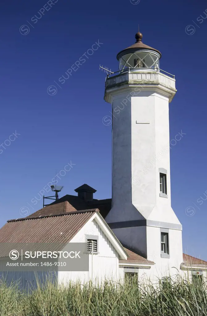 Low angle view of a lighthouse, Point Wilson Lighthouse, Port Townsend, Washington, USA