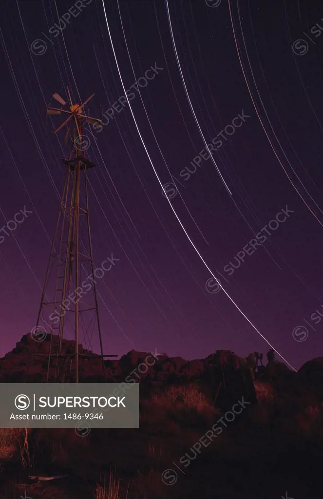 Industrial windmill in a field, Joshua Tree National Monument, California, USA