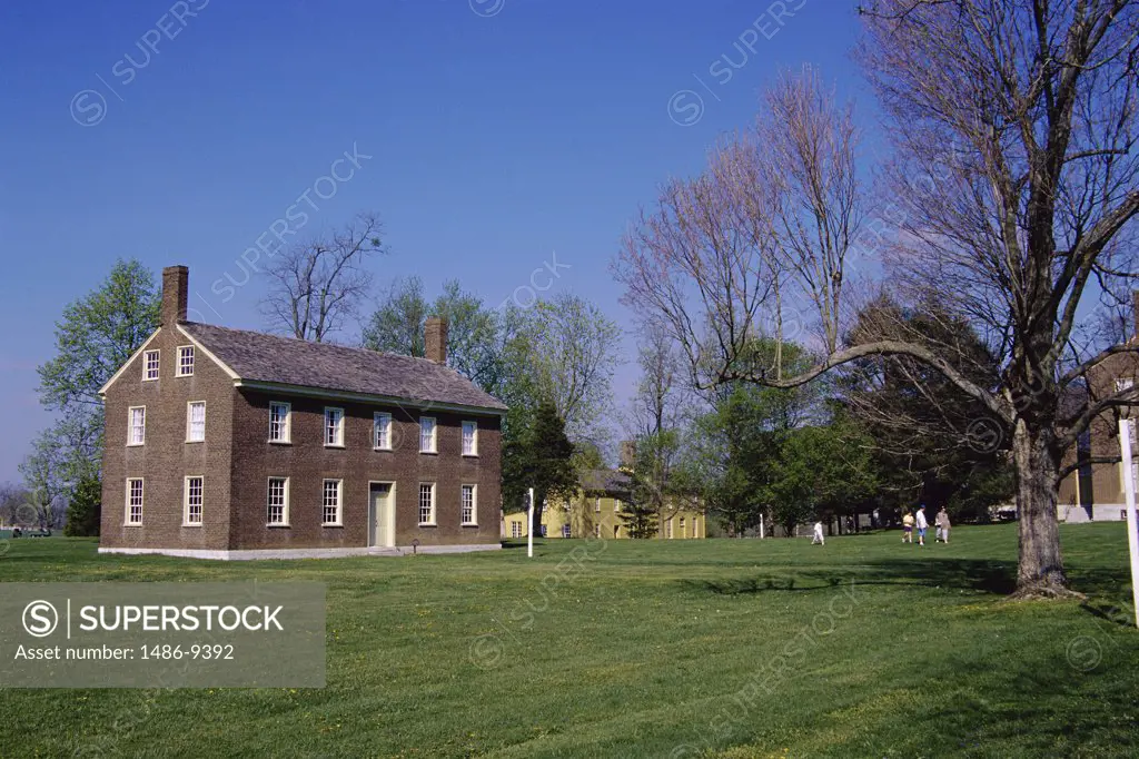 Facade of a house in a field, Shaker Village, Pleasant Hill, Kentucky, USA