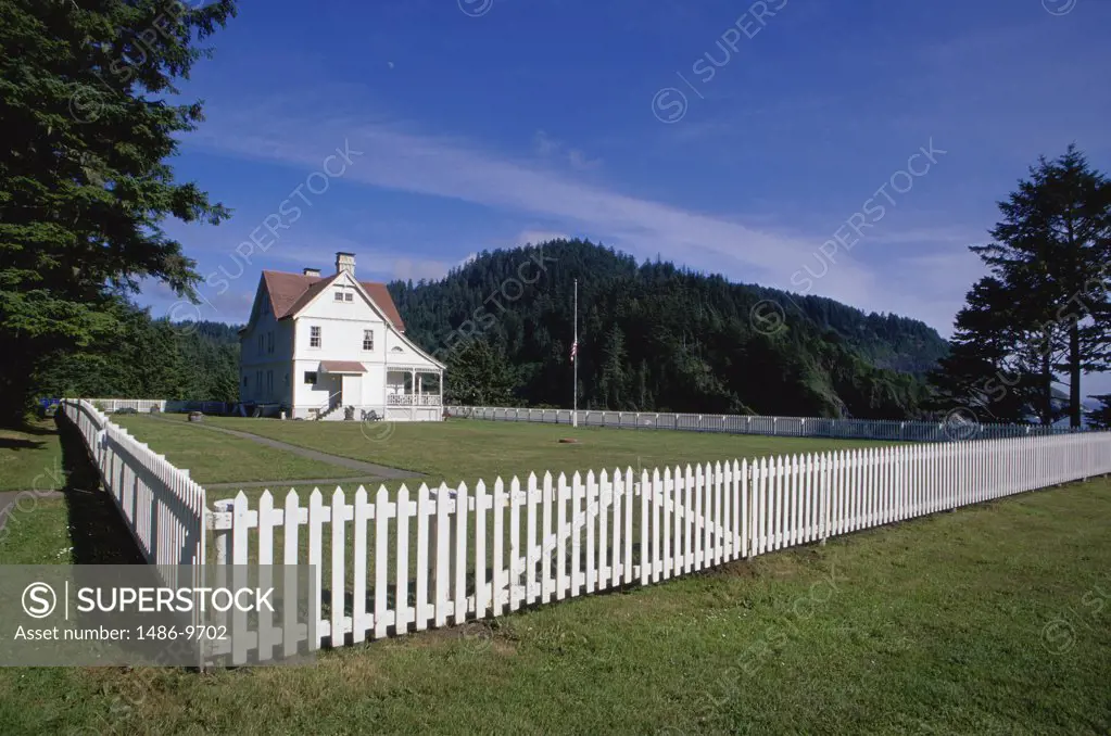 House surrounded by a picket fence, Heceta Head Lighthouse, Oregon, USA