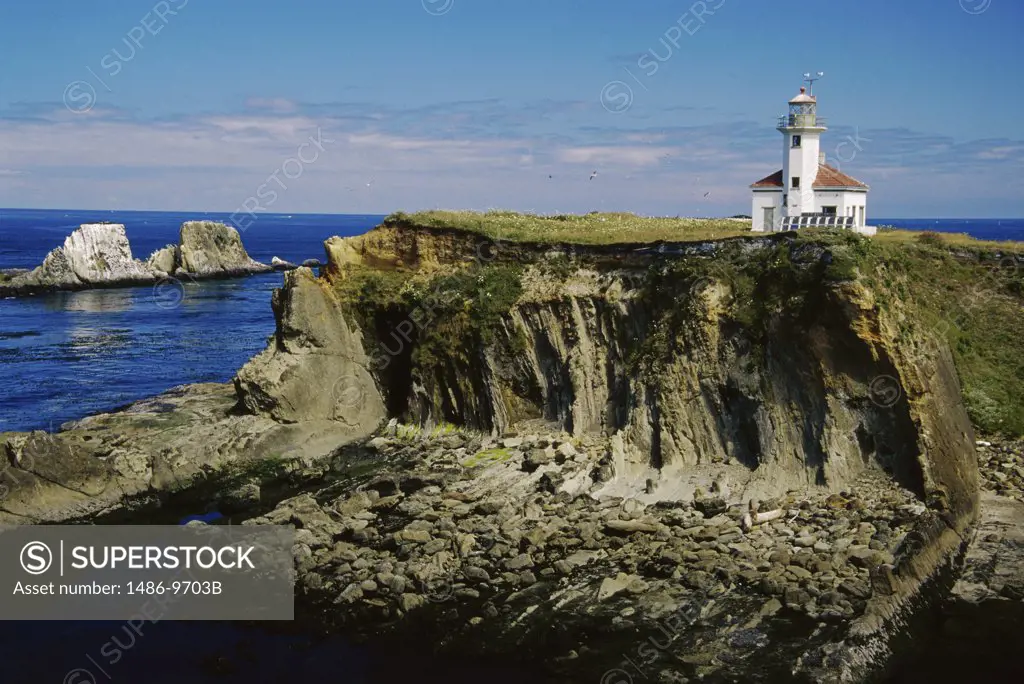 Lighthouse on a cliff, Cape Arago Lighthouse, Oregon, USA