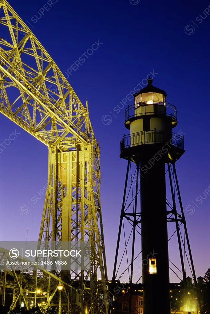 Low angle view of a lighthouse, Duluth Harbor South Breakwater Inner Lighthouse, Aerial Lift Bridge, Duluth, Minnesota, USA