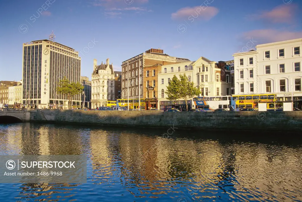 Reflection of buildings in water, Aston Quay, Liffey River, Dublin, Ireland