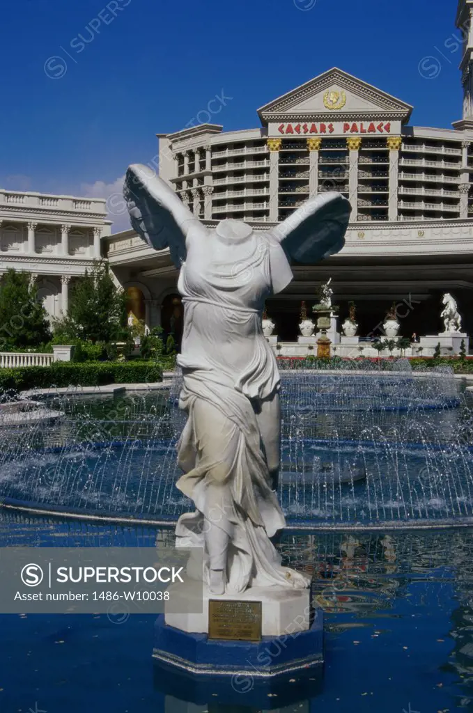 Headless statue of an angel in front of a building, Caesars Palace Hotel and Casino, Las Vegas, Nevada, USA