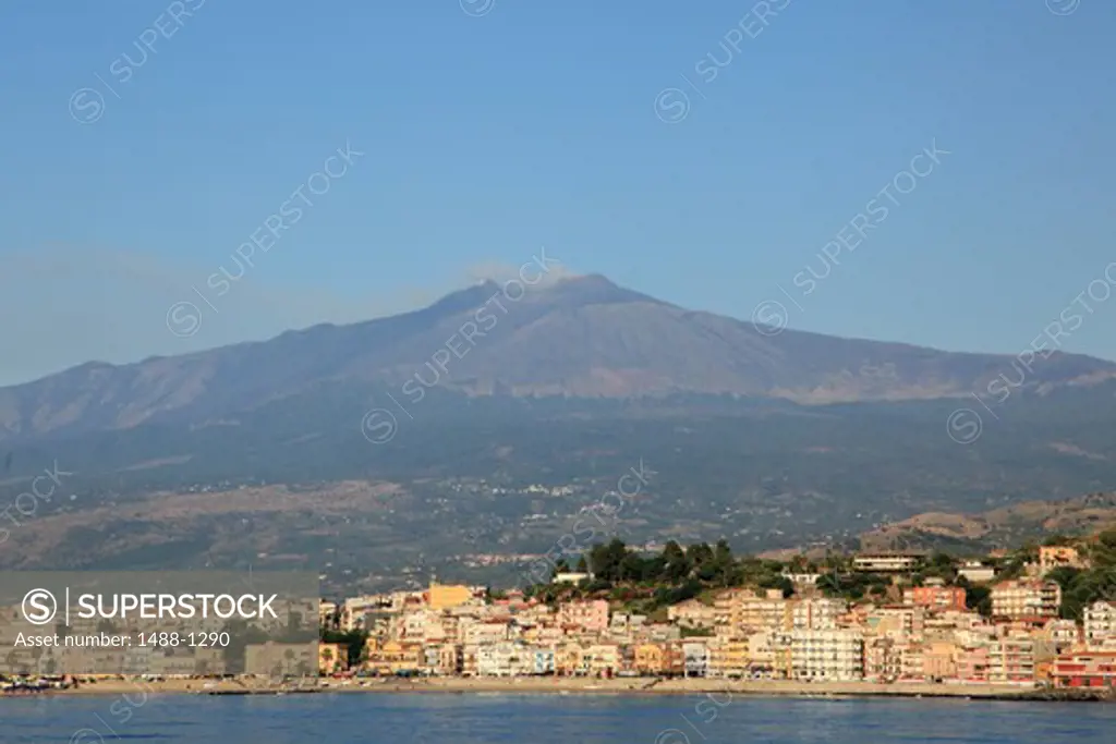 Italy, Sicily, Near Taormina, Naxos, View of town and Mount Etna
