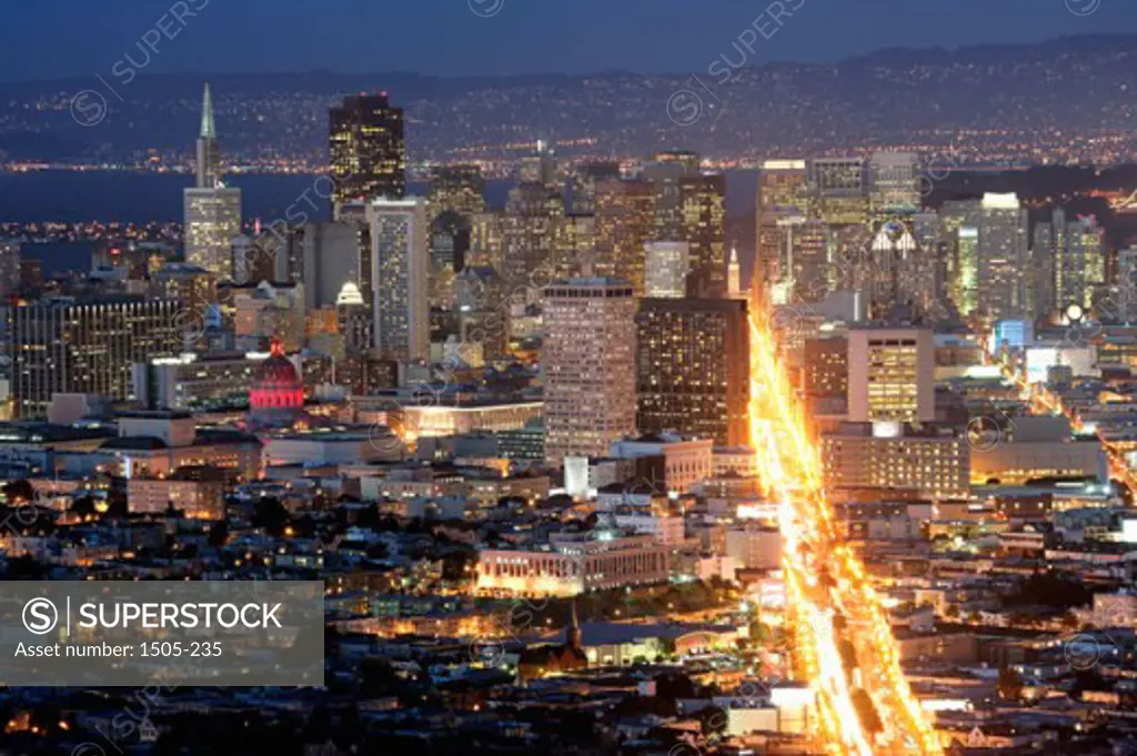 High angle view of a city lit up at dusk, San Francisco, California, USA