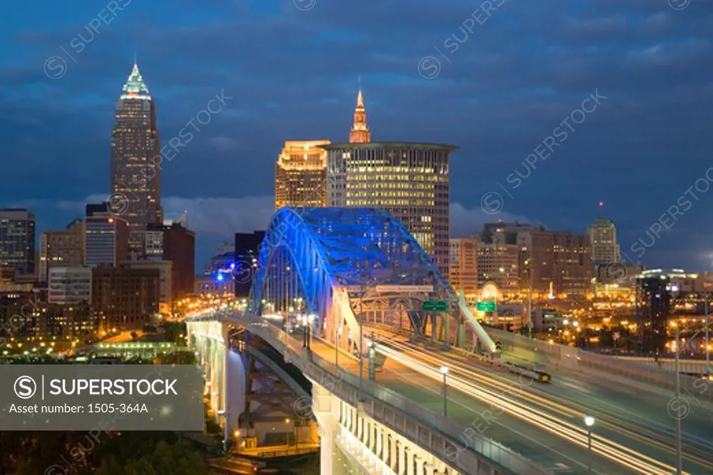 Bridge with city lit up at dusk, Veterans Memorial Bridge, Cleveland, Ohio, USA