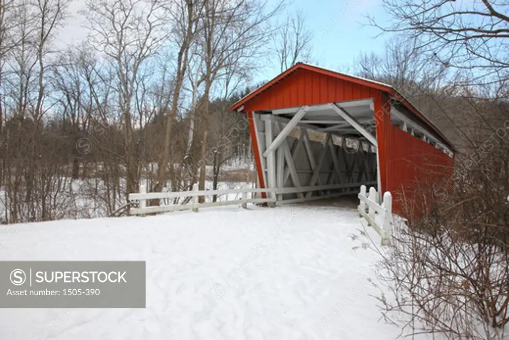 Everett road covered bridge in a snow covered forest, Cuyahoga Valley National Park, Cleveland, Ohio, USA