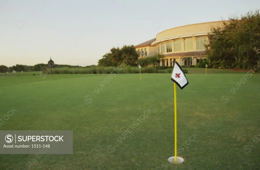Golf flag on a golf course, Florida, USA