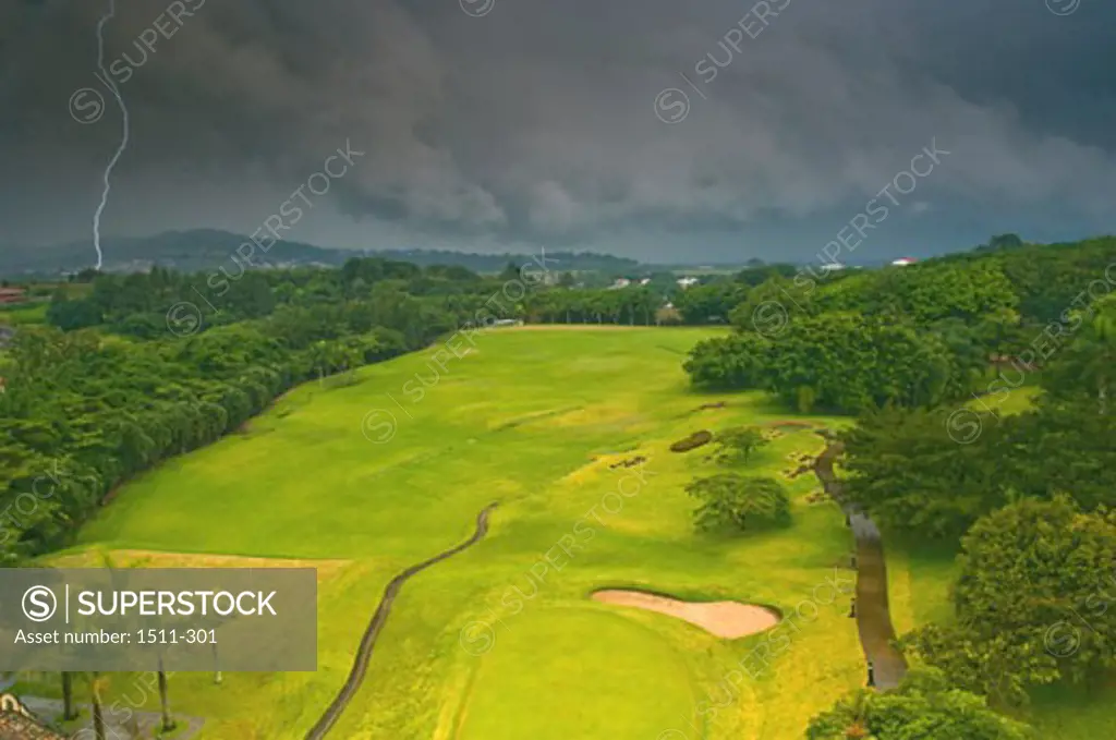 Storm clouds over a golf course, Costa Rica