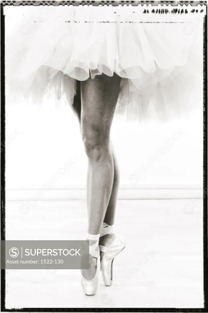 Low section view of a ballerina tiptoeing