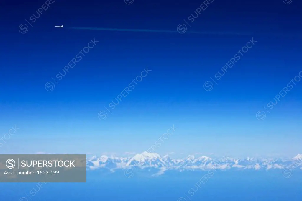 Airplane flying over the mountains, Alaska, USA