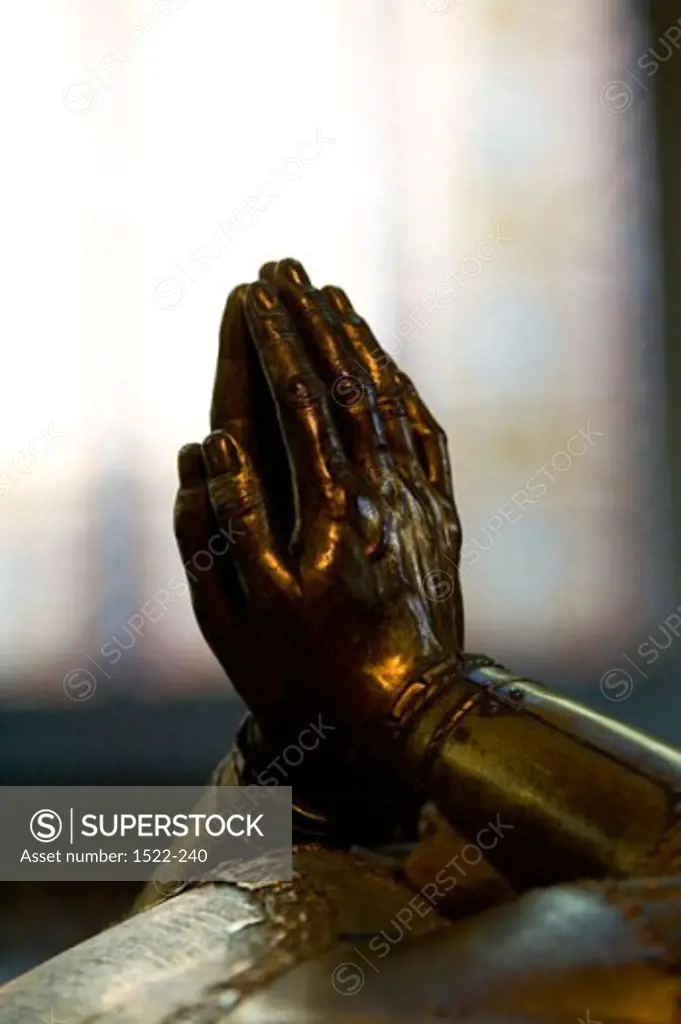 Close-up of a statue's hands in prayer position, Tomb of Charles the Bold, Church of Our Lady, Brugge, Belgium