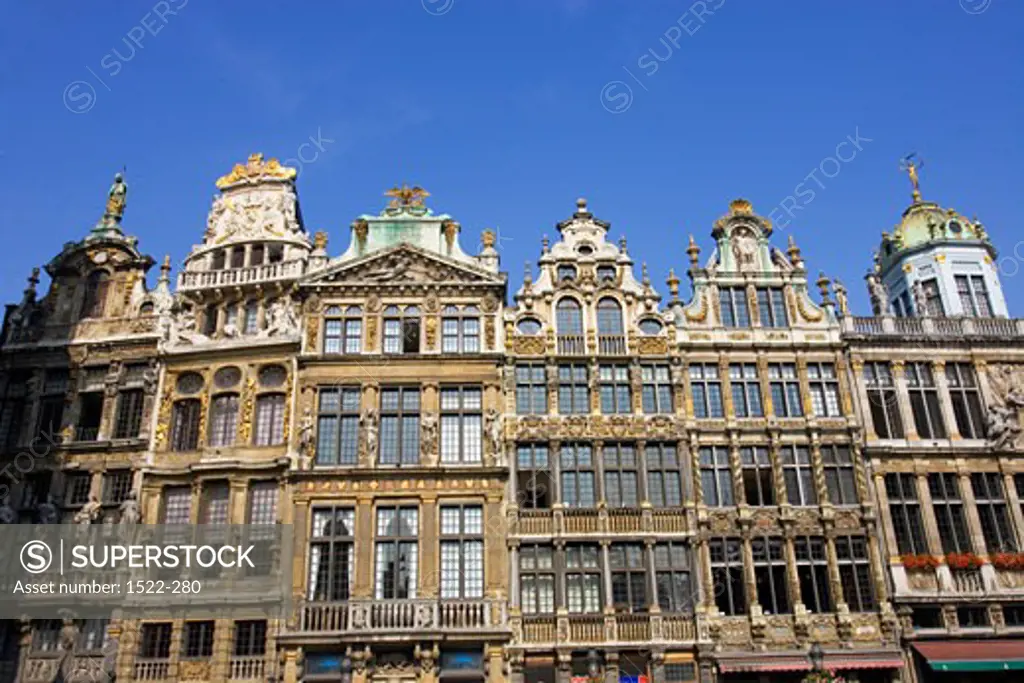 Low angle view of buildings in a row, Grand Place, Brussels, Belgium