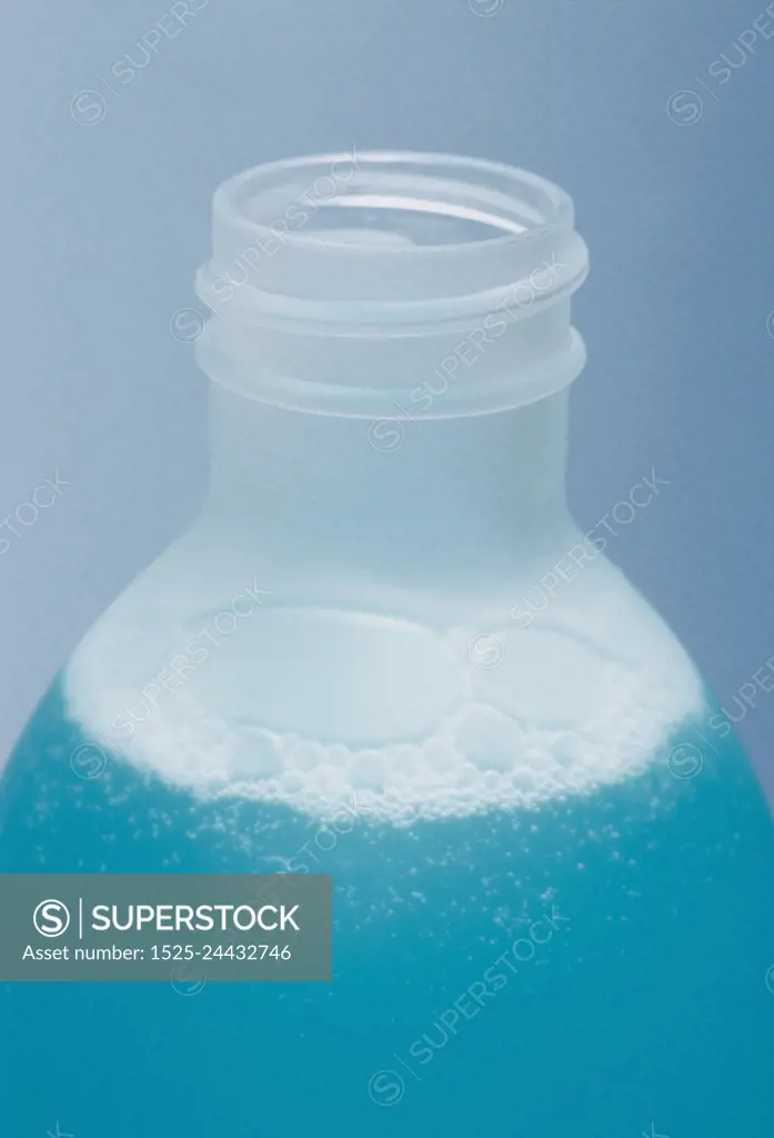 Bottle of turquoise lotion