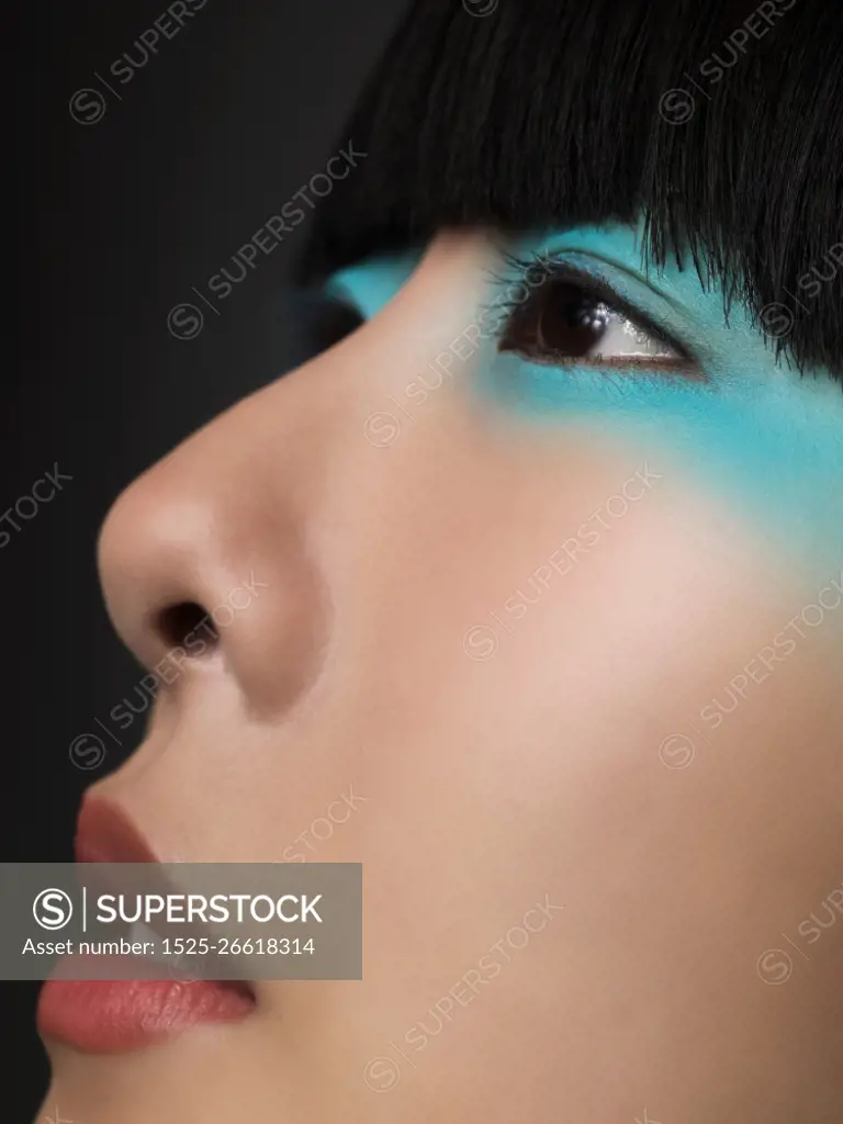 Woman with turquoise eyeshadow