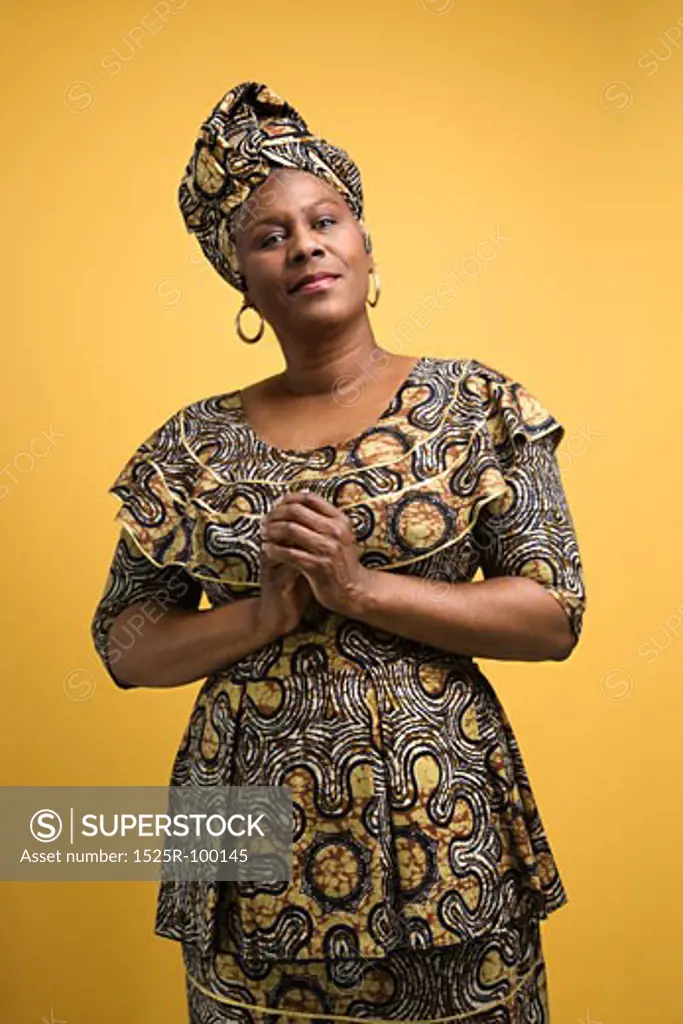 African American female mature adult in African dress.