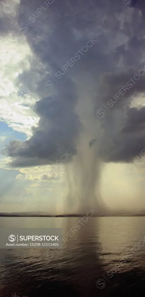 the beginning of the tornado over the lake