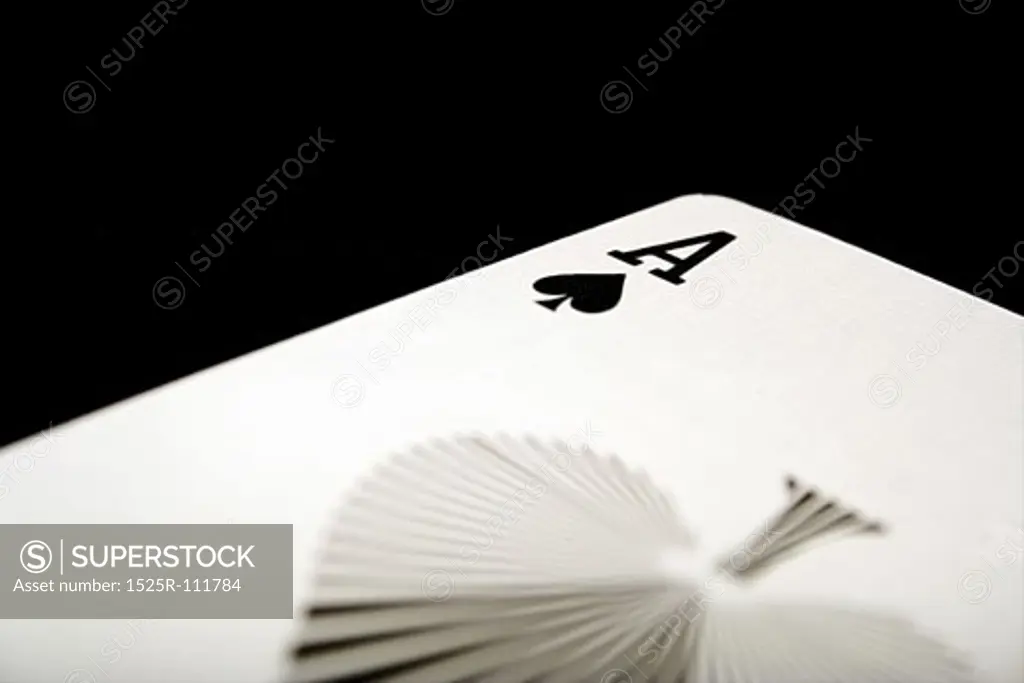 ace of spades on black background