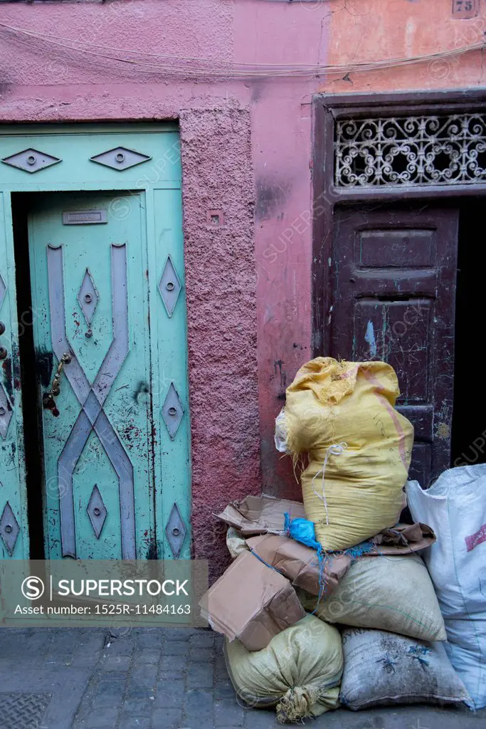 Stacked of sacks in front of doorway, Medina, Marrakesh, Morocco